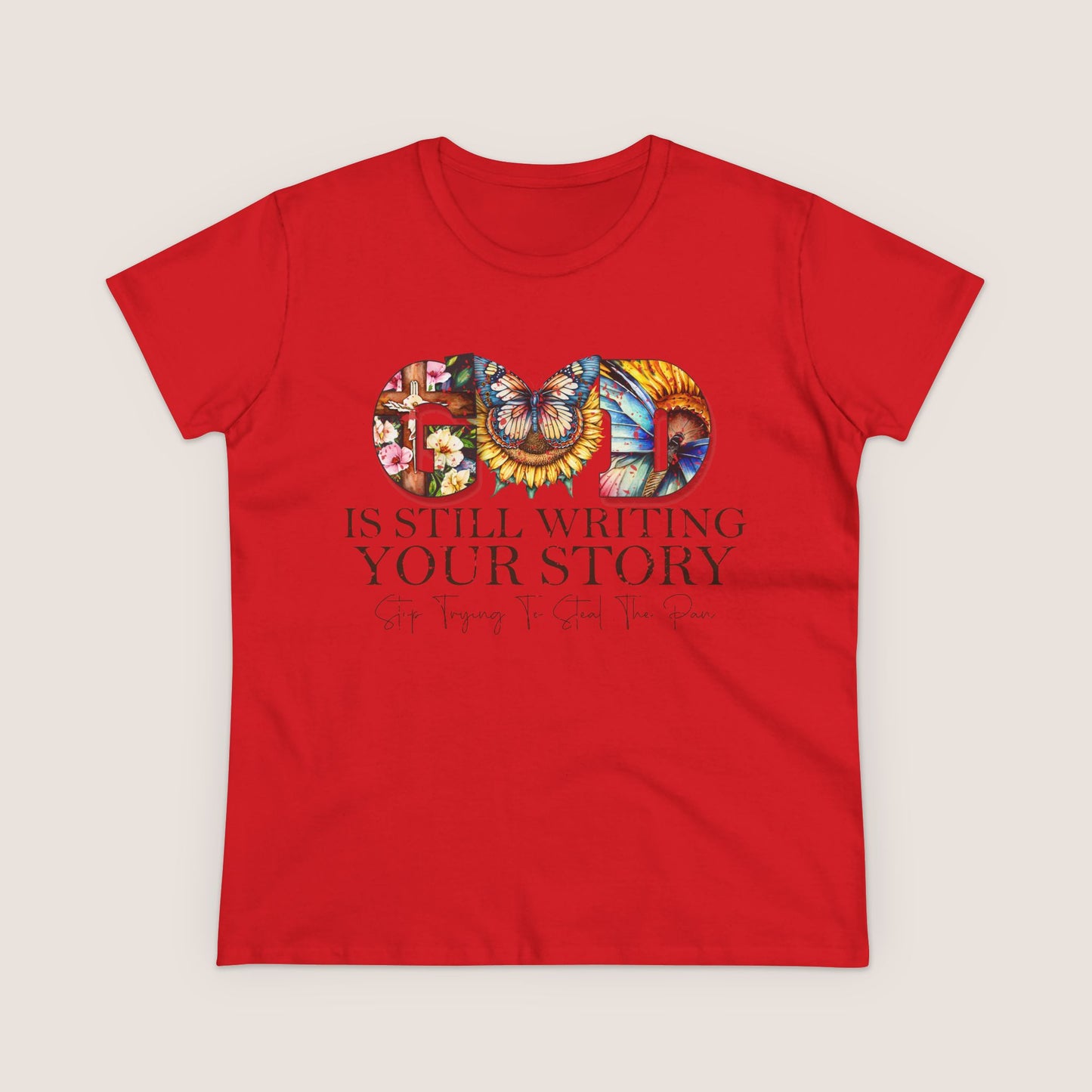 Red t-shirt with colorful design and text on a beige background